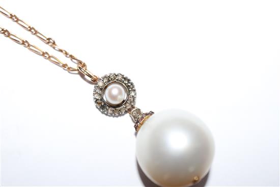 A yellow metal, rose cut diamond and cultured pearl set drop pendant, on a yellow metal chain, pendant approx. 28mm.